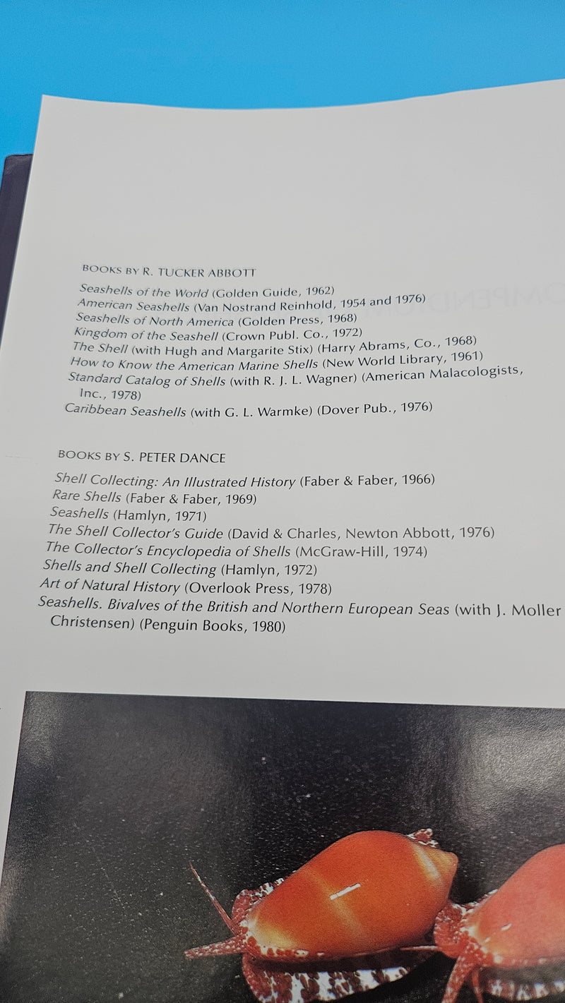 Compendium of Seashells hardcover book by R. Tucker Abbott and S. Peter Dance, 1991 edition with over 4,200 full-color marine shell photographs.