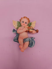 intage angel cherub magnets, each playing different instruments like cymbals, flute, and violin