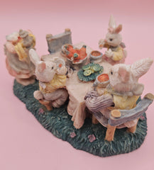 Vintage bunny figurine of rabbits at dinner table, pastel painted with one head missing, 4.3x3.2, collectible Easter decor