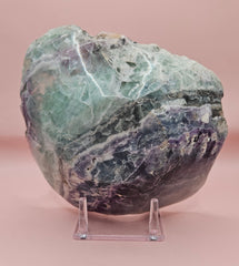 Polished fluorite crystal bowl with green banding, measuring 8 inches wide.