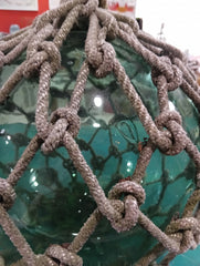 Authentic vintage green glass float with hand-tied rope netting – coastal decor accent