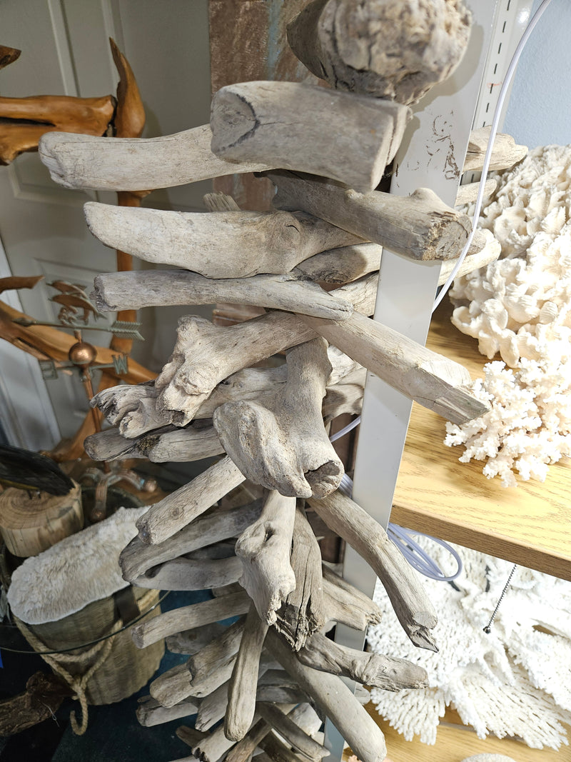 66-inch tall driftwood sculpture with natural rustic textures, ideal for decor