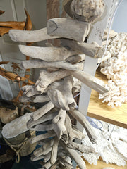 66-inch tall driftwood sculpture with natural rustic textures, ideal for decor