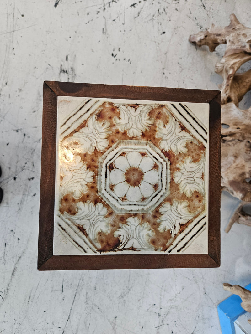 wooden plant stand with floral ceramic tile top and tiered shelves, 27.5 inches tall.