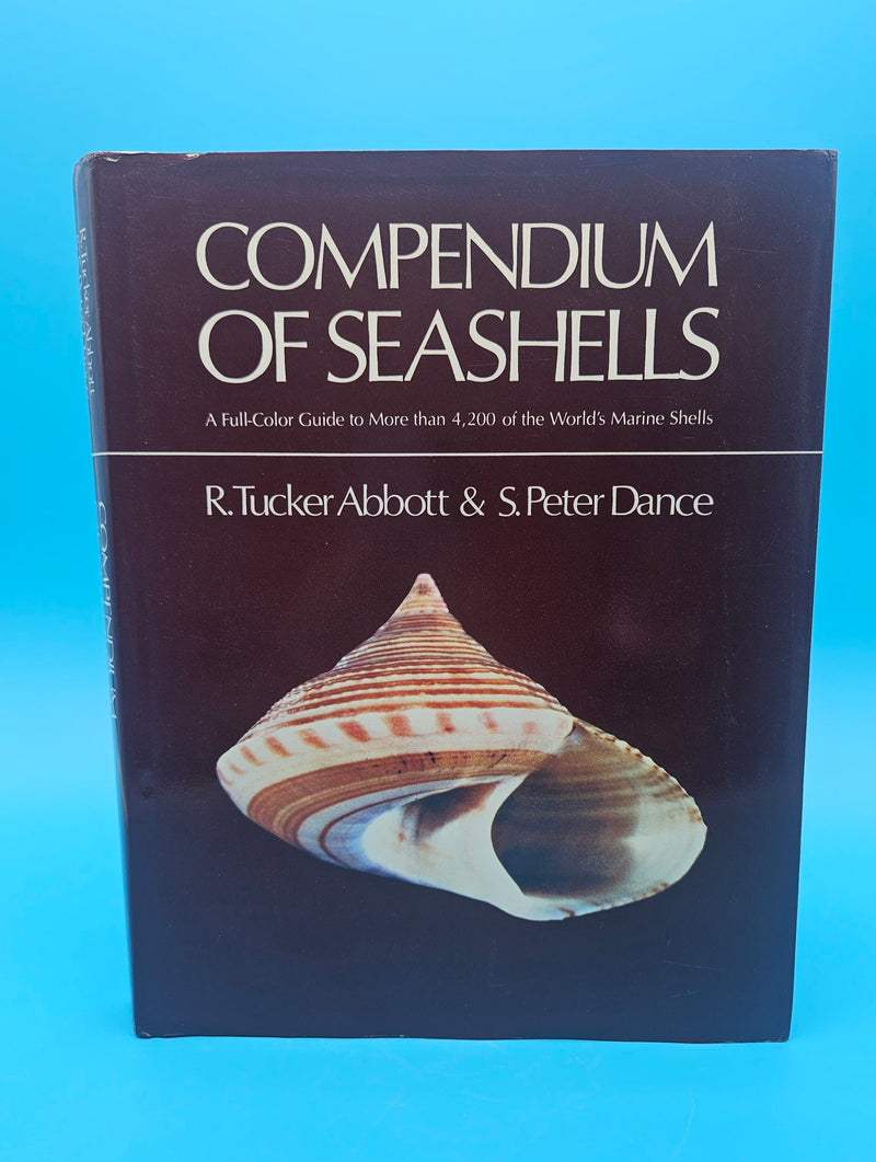 First edition Compendium of Seashells hardcover book by R. Tucker Abbott & S. Peter Dance, 1982 edition with full-color marine shell photography.