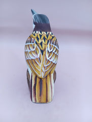  Hand-painted yellow and purple songbird figurine on wood base – 5.5 to 6 inches