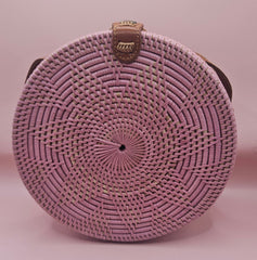 Round rattan crossbody bags in 4 styles—natural, pink, whitewash, and floral weave—with fabric-lined interior