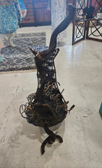 Large abstract wood and woven rattan sculpture with circular form and coil accents, 23.5