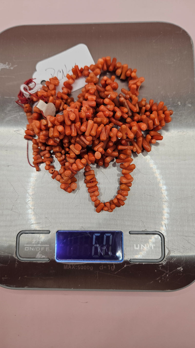 Strand of Mediterranean red coral beads for jewelry making, 60 grams, irregular polished pieces in warm red hues