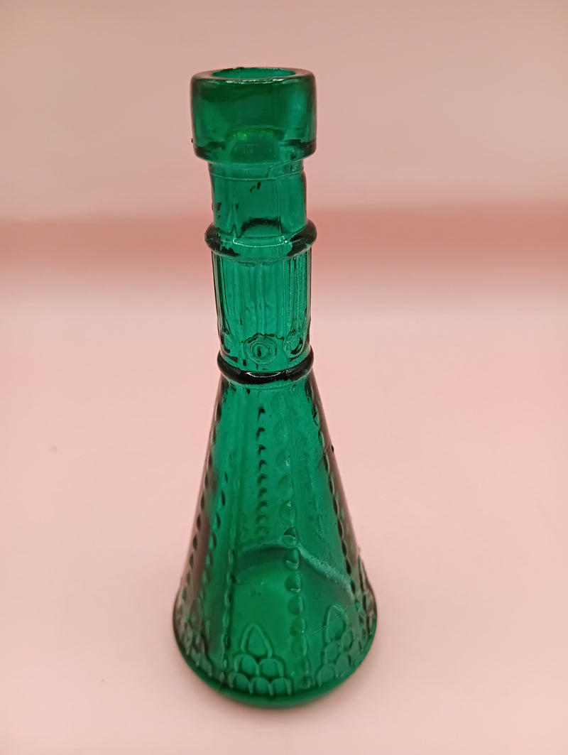 Miniature clear apothecary-style glass bottle with embossed design, no stopper, from Shell World