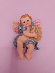 intage angel cherub magnets, each playing different instruments like cymbals, flute, and violin