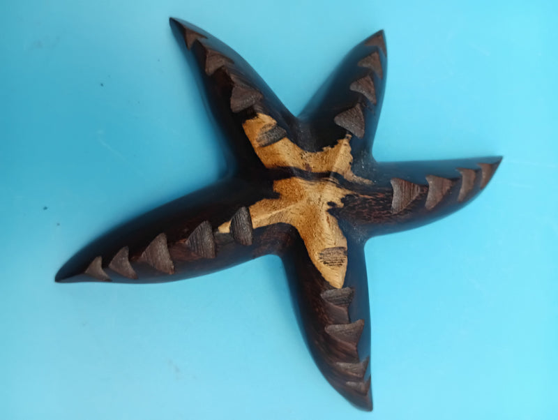 Hand-carved 4-inch ironwood starfish coastal déco
