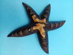Hand-carved 4-inch ironwood starfish coastal déco