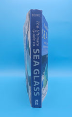 The Ultimate Guide to Sea Glass 2014 hardcover by Mary Beth Beuke, coastal collecting and identification book with colorful blue and green sea glass on wooden dock.
