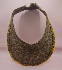woven palm leaf visors with colorful edge stitching in black, pink, yellow, and light pink