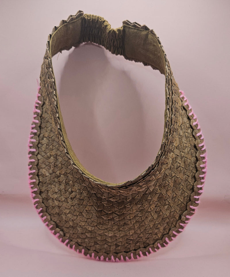woven palm leaf visors with colorful edge stitching in black, pink, yellow, and light pink