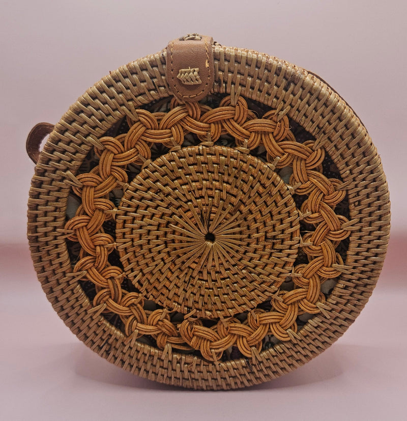 Round rattan crossbody bags in 4 styles—natural, pink, whitewash, and floral weave—with fabric-lined interior