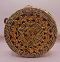 Round rattan crossbody bags in 4 styles—natural, pink, whitewash, and floral weave—with fabric-lined interior