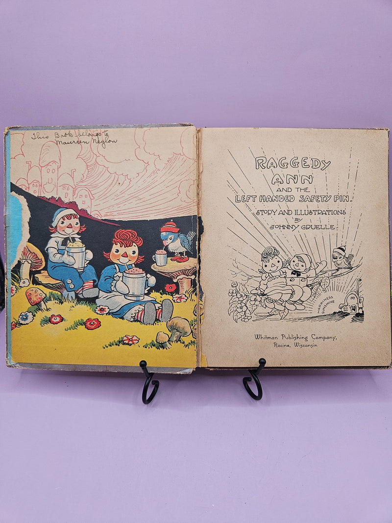 Very rare vintage 1935 edition of Raggedy Ann and the Left Handed Safety Pin by Johnny Gruelle, collectible hardcover book