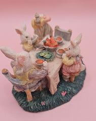 Vintage bunny figurine of rabbits at dinner table, pastel painted with one head missing, 4.3x3.2, collectible Easter decor