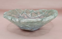 Polished fluorite crystal bowl with green banding, measuring 8.5 inches wide.