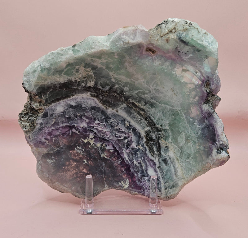 Polished fluorite crystal bowl with green banding, measuring 8 inches wide.