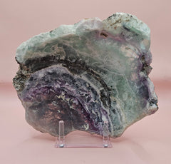 Polished fluorite crystal bowl with green banding, measuring 8 inches wide.