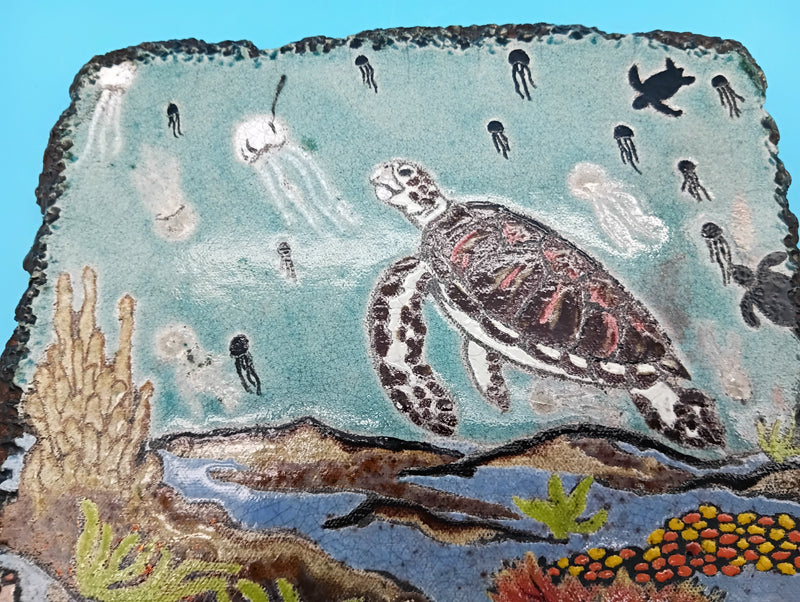 Handmade Raku fired ceramic sea turtle wall art by Bobbie McCrea, North Shore Pottery