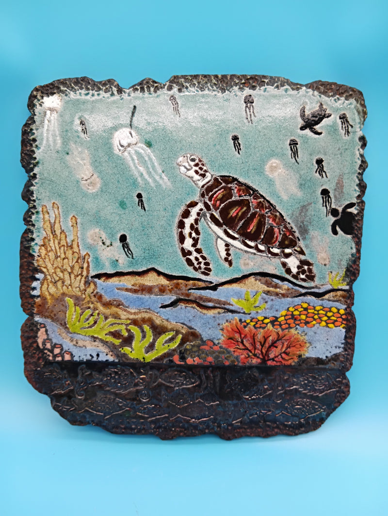 Handmade Raku fired ceramic sea turtle wall art by Bobbie McCrea, North Shore Pottery