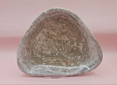 Polished natural onyx shell bowls with layered cream, gray, and brown tones