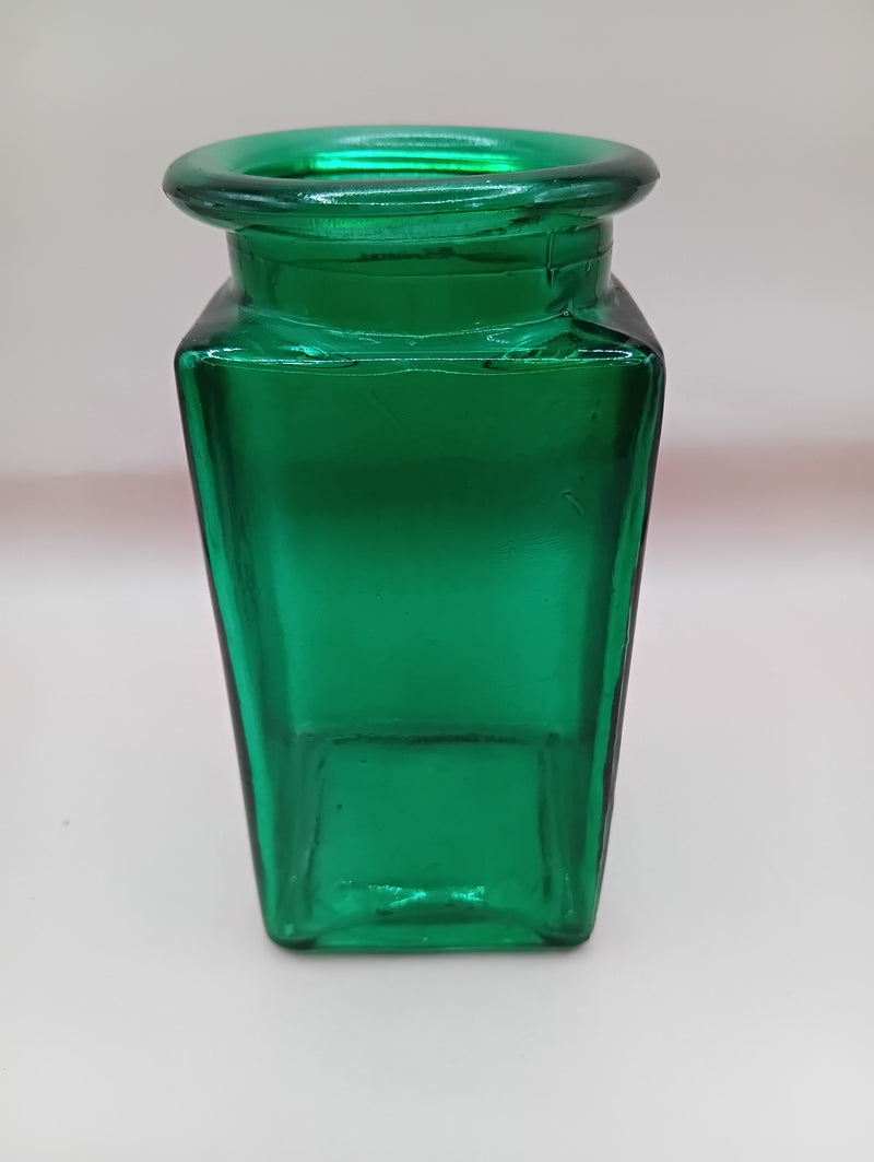 Colorful vintage square glass bottles in green, red, purple, and blue – 6" tall