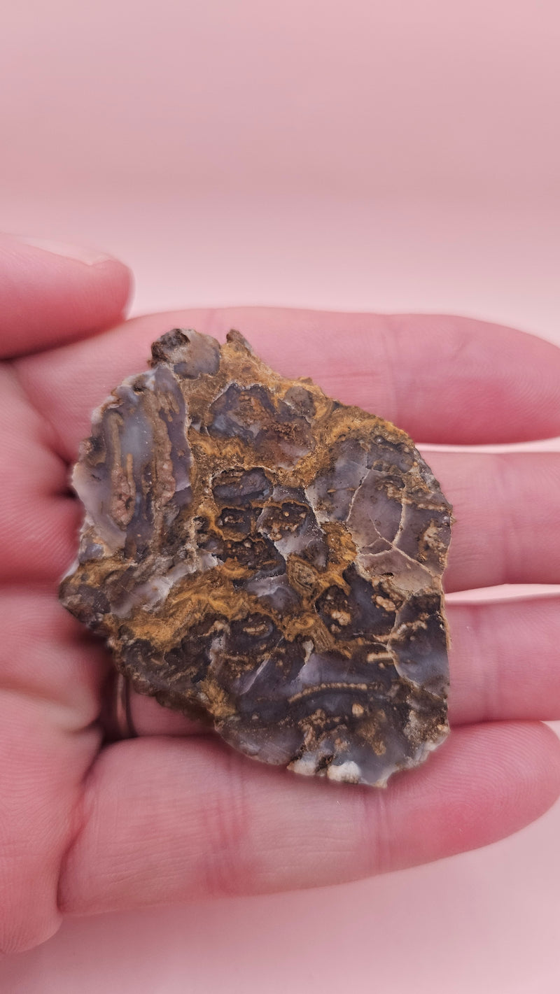 23g Moss Agate slab with smoky lavender tones and golden mossy veins, 2.1x1.7 inch specimen held in hand.