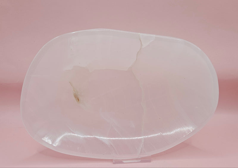 Polished white onyx dish with subtle marbling