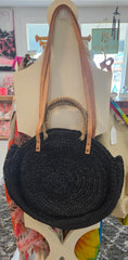 round woven straw tote bags in beige, black, and brown 