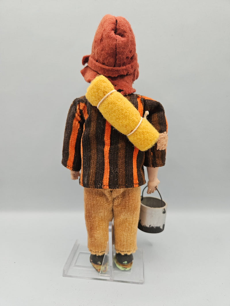 Close-up view of a vintage 8" Australian miner swagman doll, featuring a traditional hat, rugged clothing, and swag bag. The doll is a perfect representation of the iconic Australian Outback style.