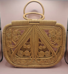 hardwood butterfly-shaped handbags in natural and dark finishes
