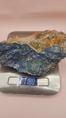 Rough malachite azurite mineral specimen weighing 1205 grams with vibrant blue and green coloration on a raw matrix.