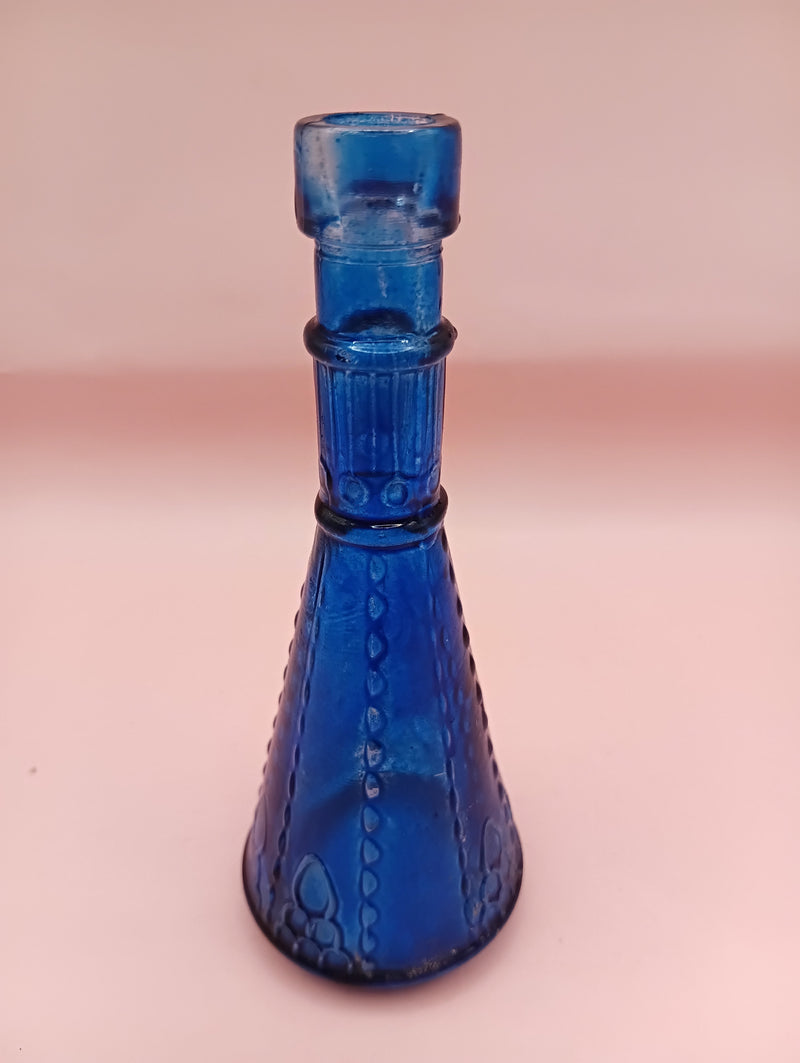 Miniature clear apothecary-style glass bottle with embossed design, no stopper, from Shell World