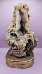 Teak mounted quartz geode with shimmering crystals on a polished wood base, 12x6.25 inches, perfect for home decor