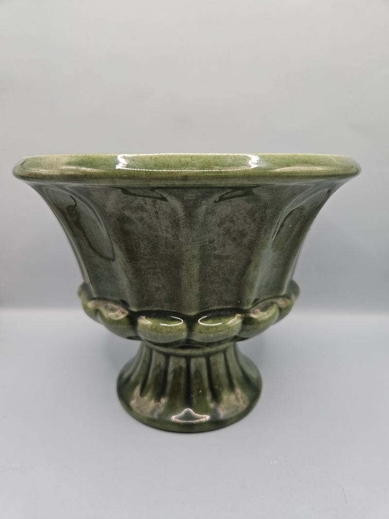 A vintage olive green ribbed pedestal planter/vase by FTD and Haeger, perfect for home decor or displaying plants, with a mid-century aesthetic.