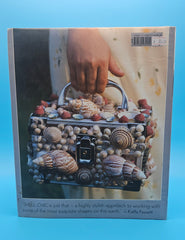 Shell Chic hardcover book by Marlene Hurley Marshall, coastal décor guide featuring seashell-decorated projects, photography by Sabine Vollmer von Falken, 2002 Storey Publishing edition.