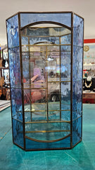 vintage stained glass curio cabinet with blue ripple glass sides and etched glass door