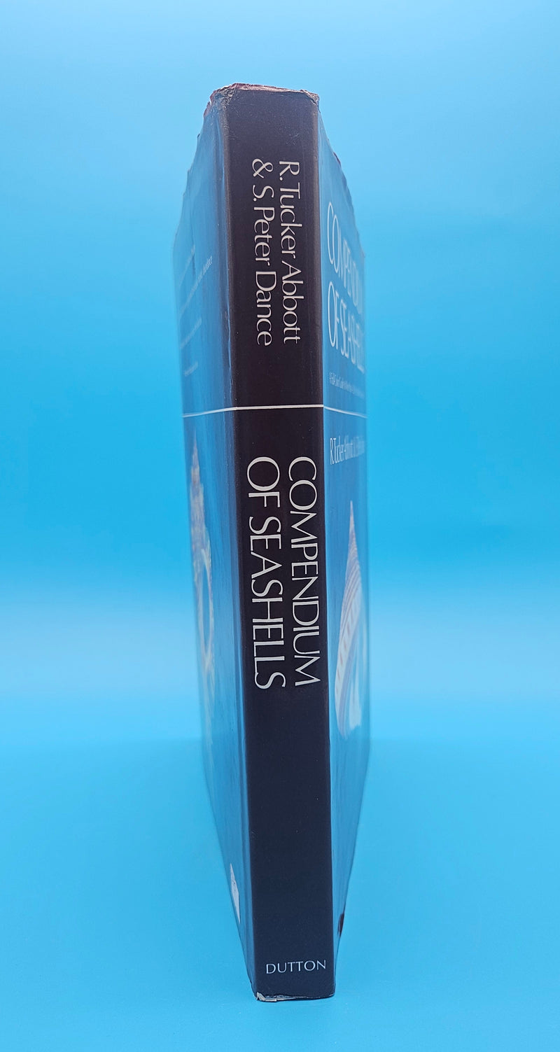 Compendium of Seashells hardcover book by R. Tucker Abbott and S. Peter Dance, 1991 edition with over 4,200 full-color marine shell photographs.