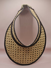  woven rattan visors with faux leather trim in black, red, green, and brown