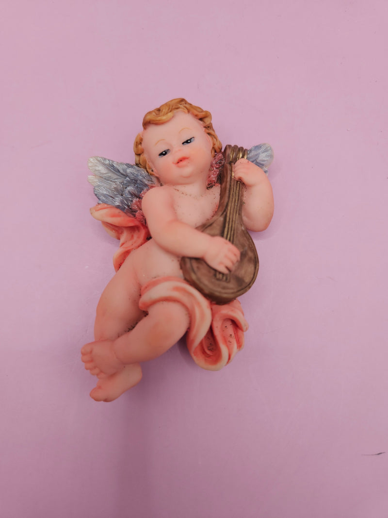 intage angel cherub magnets, each playing different instruments like cymbals, flute, and violin