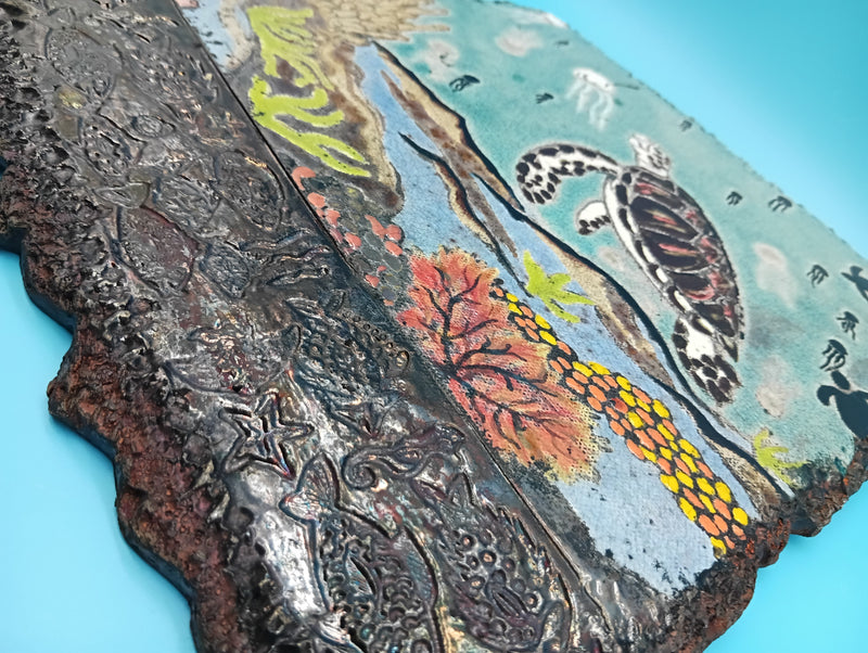 Handmade Raku fired ceramic sea turtle wall art by Bobbie McCrea, North Shore Pottery