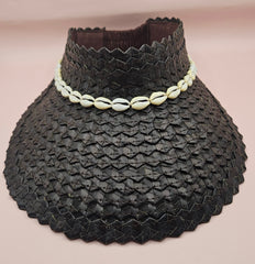  woven palm visors with cowrie shell trim in black, blue, yellow, and green