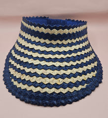  striped woven palm visors in blue, green, and natural cream colors with wide brims