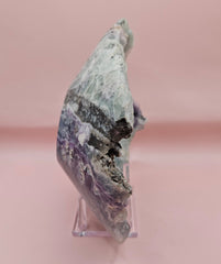 Polished fluorite crystal bowl with green banding, measuring 8 inches wide.