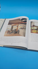 Cover of Beachfront Homes by Jim Kemp featuring bright coastal living room with ocean view through open windows.